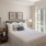 Large windows that bring in ample natural lighting in apartment bedrooms at Aventon Huntington Station