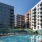 Two-Bedroom Apartments in Alexandria, VA - Aventon Huntington Station - Swimming Pool with a Sun-Shelf, Lounge Chairs, and Manicured Landscapes