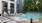 Three Bedroom Luxury Apartments in Alexandria VA - Aventon Huntington Station - Resort Style Pool with Sunshelf, Surrounding Sundeck with Lounge Seating, Umbrellas, Life Guard Chair and Lush Landscaping