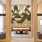3 Bedroom Luxury Apartments in Alexandria VA - Aventon Huntington Station - Semi Private Event Room with Wet Bar, Plant Featured Wall Design, Pendant Lighting, Floor To Ceiling Windows, Benches, Chairs, Tables, and Mounted TV